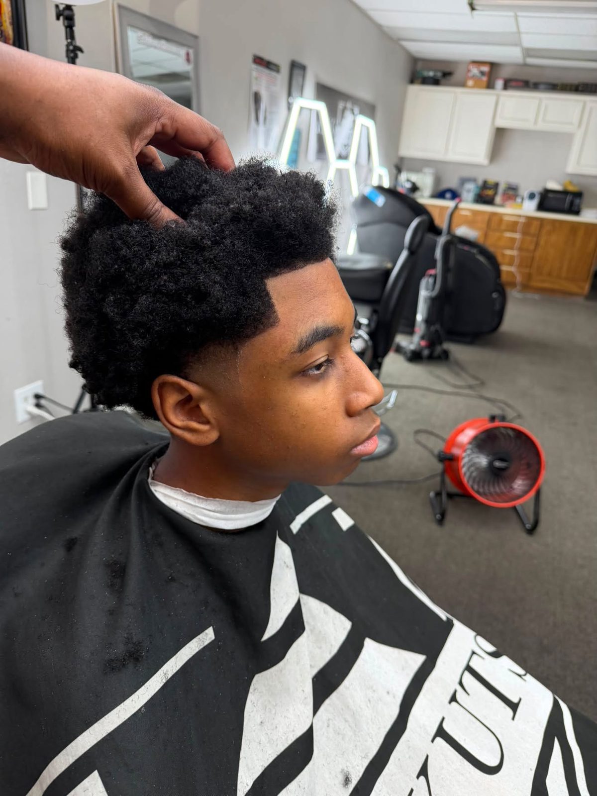 Textured afro fade haircut