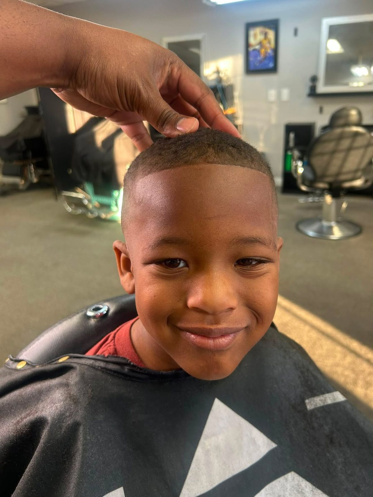 Young client's clean buzz cut